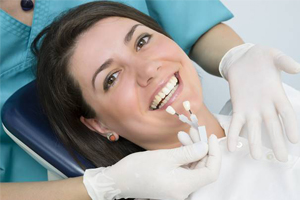 smiling woman in dentist's chair