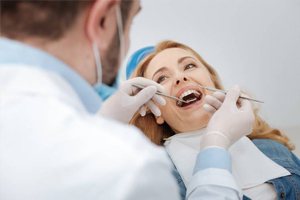 a woman receiving dental care